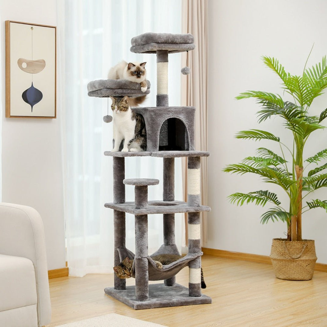 A 143 cm tall grey cat tree with a built-in ladder, dual condos, and a bottom-level hammock.