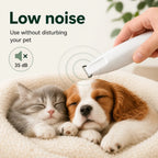 Quiet 35 dB pet grooming trimmer being used near a sleeping kitten and puppy to demonstrate low noise operation.