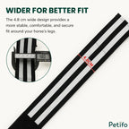 Close-up measurement of the 4.8 cm width on a reflective equestrian leg band using digital calipers.