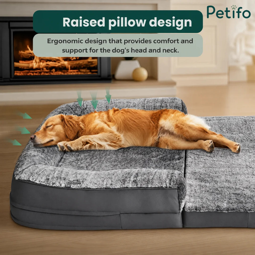 A golden retriever sleeping comfortably on a pet bed with an ergonomic raised pillow design that supports the dog's head and neck.