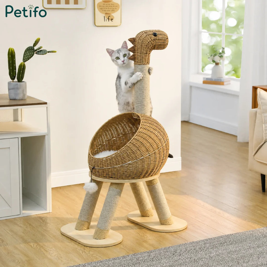 A stylish, dinosaur-shaped Petifo cat bed with sisal scratching legs placed in a modern living room.