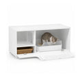 A white Petifo cat litter cabinet with the front door lowered, revealing an internal litter tray with a cat inside and a side shelf containing a small basket.