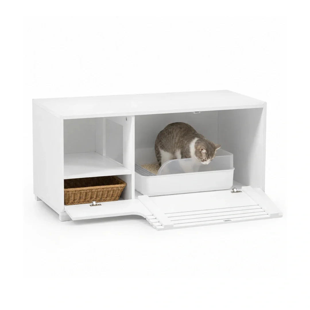 A white Petifo cat litter cabinet with the front door lowered, revealing an internal litter tray with a cat inside and a side shelf containing a small basket.