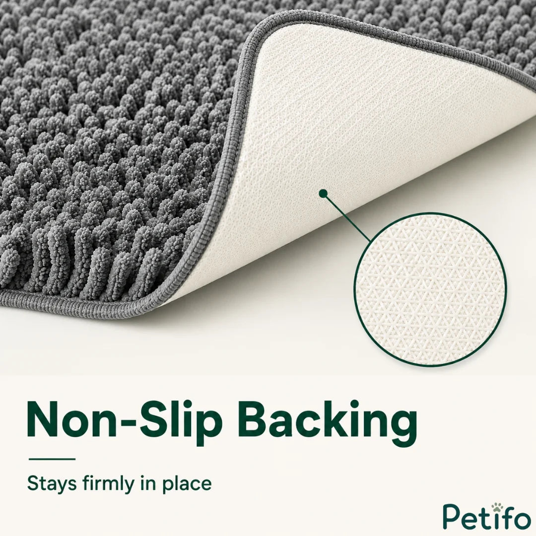 Close-up angle showing the textured anti-skid backing of the grey pet mat designed to prevent sliding on floors.
