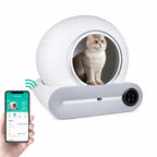 A cat sits inside this smart automated cat litter box, which can be monitored and controlled via a smartphone app.
