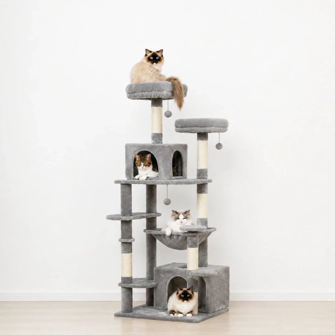 Three cats exploring a beige multi-level cat tree featuring a ladder, enclosed condos, a side hammock, and sisal scratching posts.