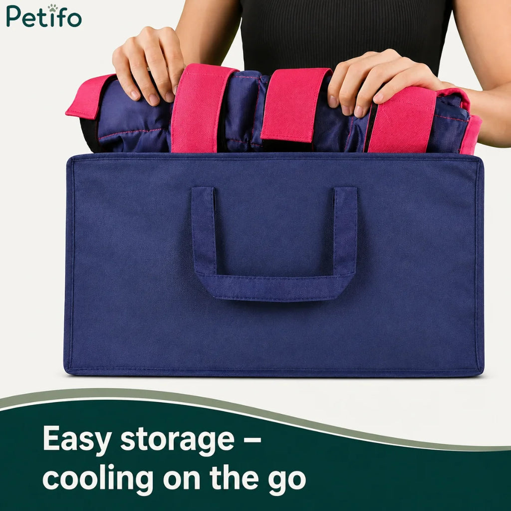 Person packing blue and pink horse ice wraps into a matching portable storage bag.