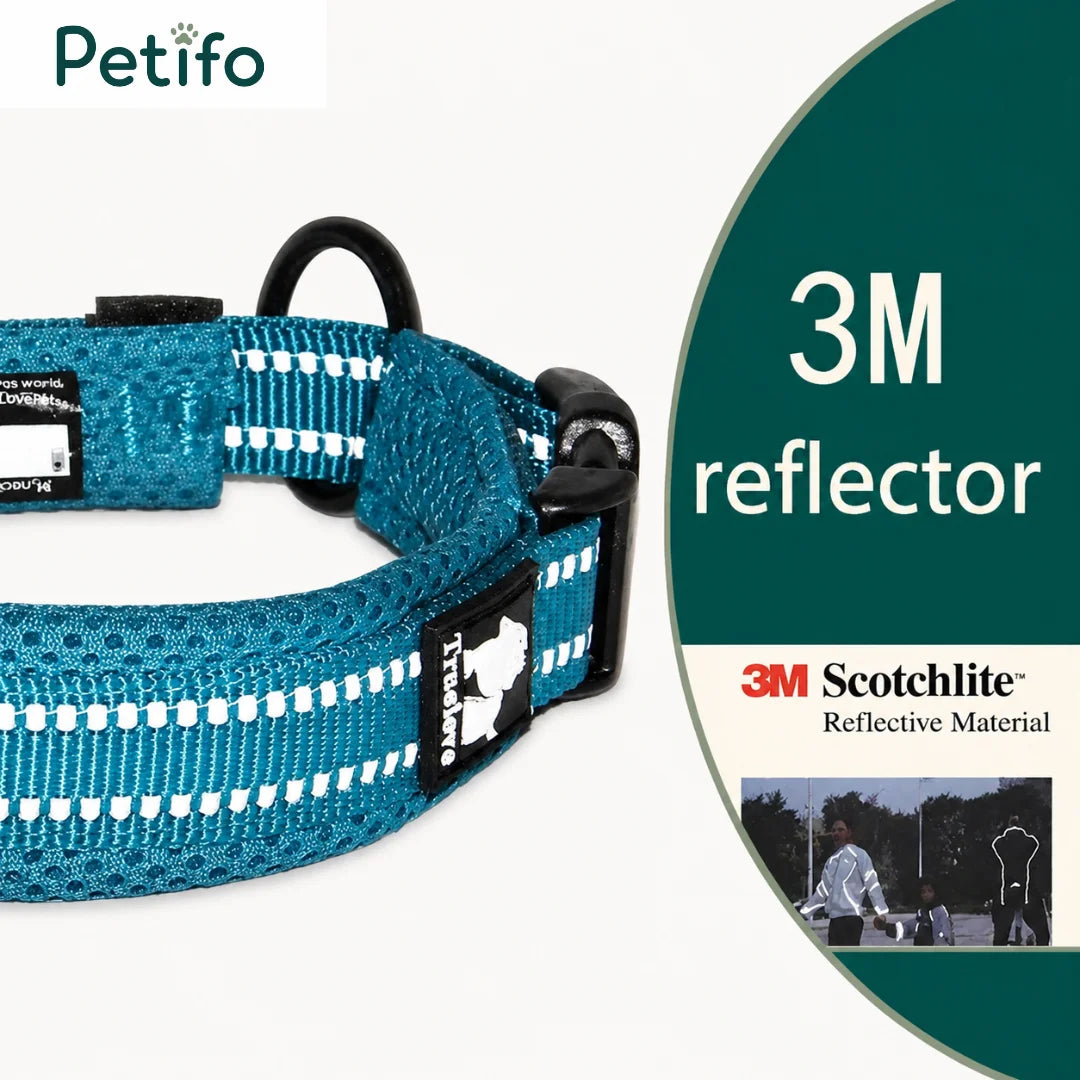 A product shot of a blue dog collar featuring 3M Scotchlite reflective material for enhanced visibility.