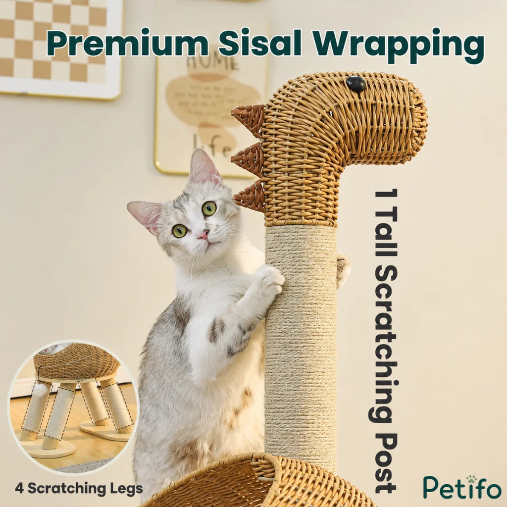 Cat interacting with the tall sisal-wrapped scratching post on a dinosaur-themed Petifo cat tree.