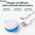 USB rechargeable Petifo LED dog safety light next to its charging cable.