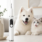 Detixy ultrasonic tooth scaler pro standing next to a happy, clean-toothed white dog and a long-haired cat on a couch.