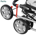 Close-up of the Petifo pet stroller's wheel and frame structure with a red locking mechanism.