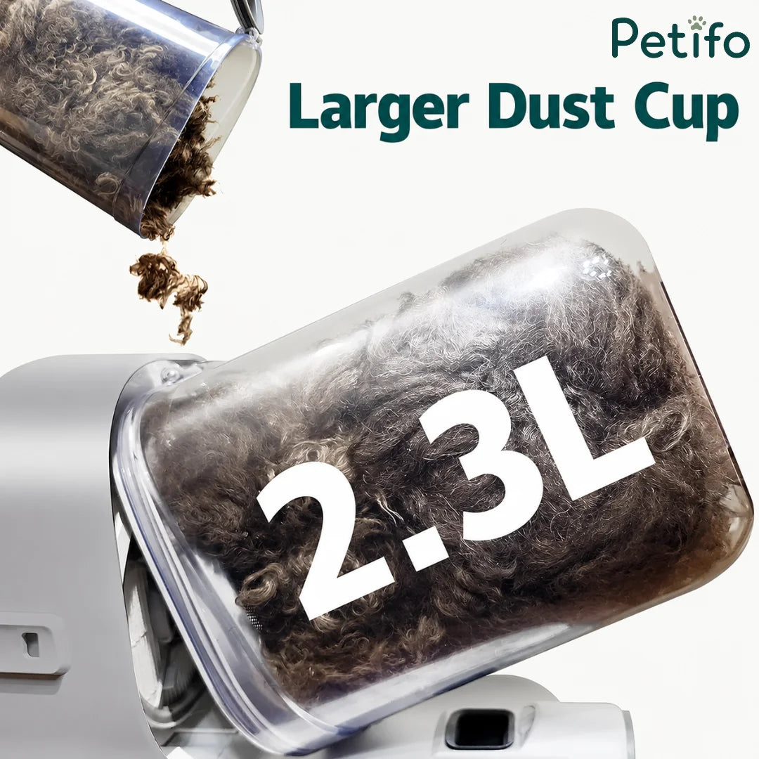 Close-up view of the Petifo vacuum cleaner's large 2.3L dust cup being emptied of collected pet hair.
