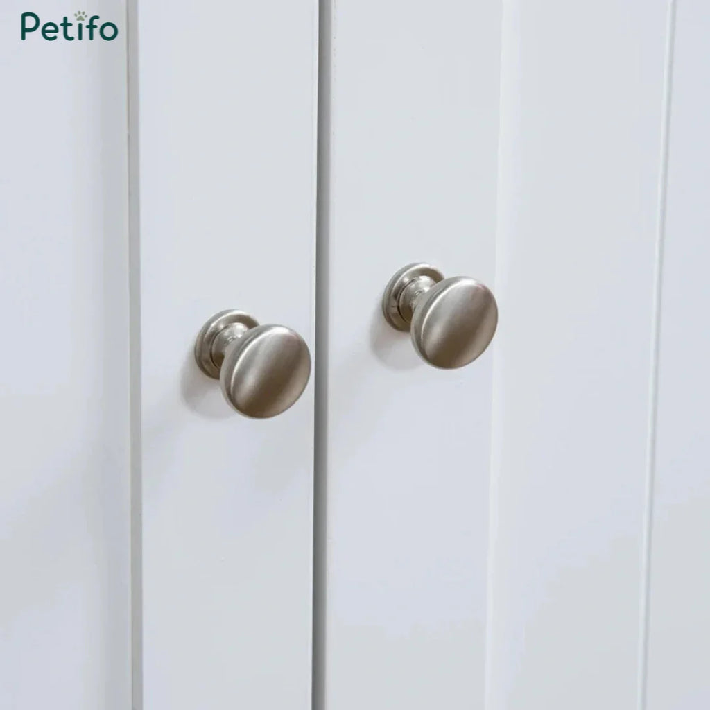 Close-up view of the brushed metal door knobs on the white Petifo cat litter house, demonstrating its clean, modern design.