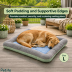 A golden retriever resting comfortably on a large cooling pet bed placed on an outdoor wooden deck.