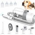 Complete set of Petifo pet grooming tools including the main vacuum unit, hose, clippers, brushes, and four different clipper guide combs.