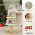 A neutral-colored, three-tier holiday cat tower that includes ten customizable, random ornaments and a spring-loaded pompom topper. 