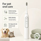 Electric pet toothbrush for daily oral care being featured alongside a happy dog and cat.