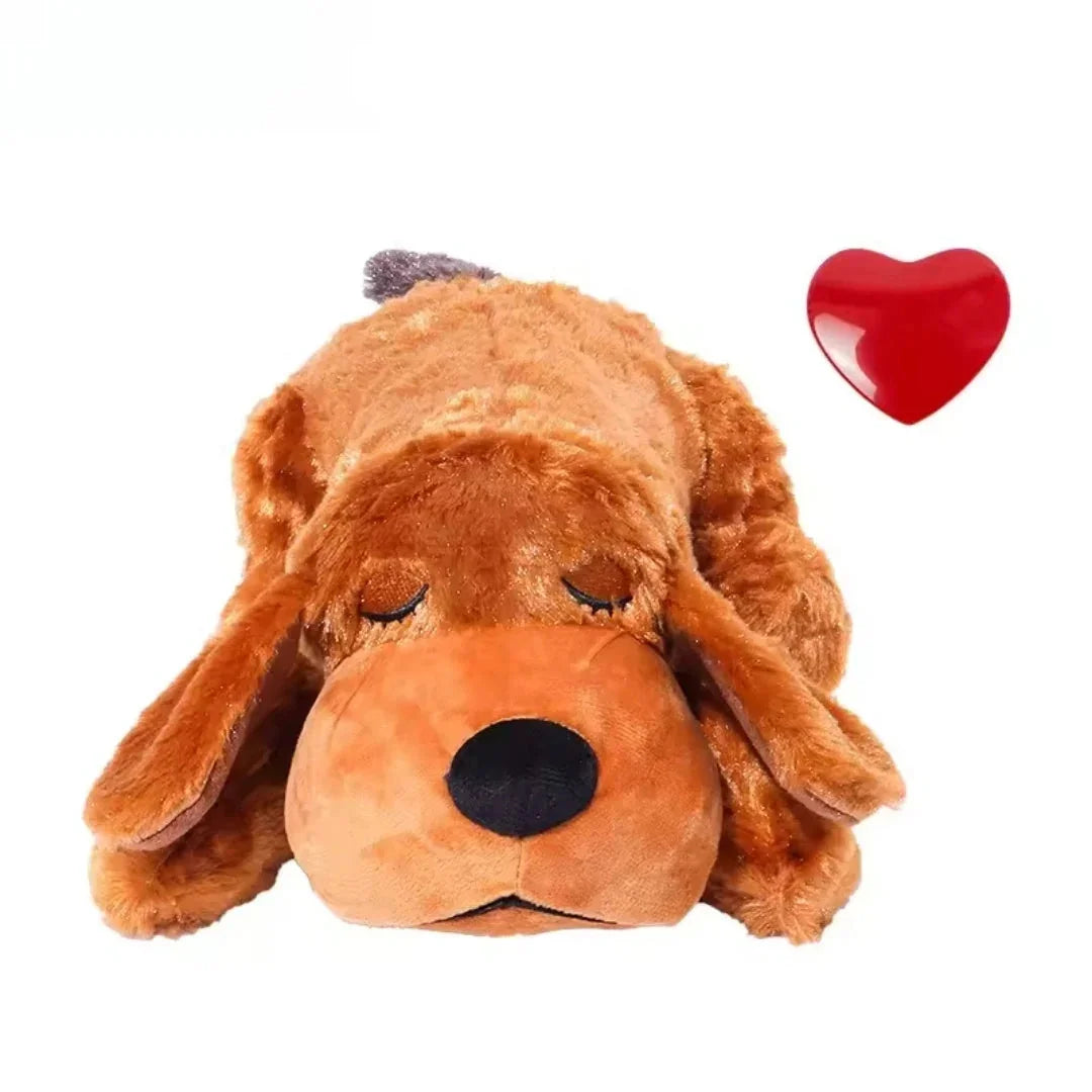 Cute brown plush companion puppy toy shown from a top angle with a detachable red heart module.