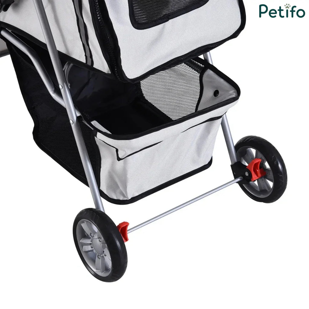 Detailed view of the Petifo stroller's bottom storage basket and rear wheel brakes.