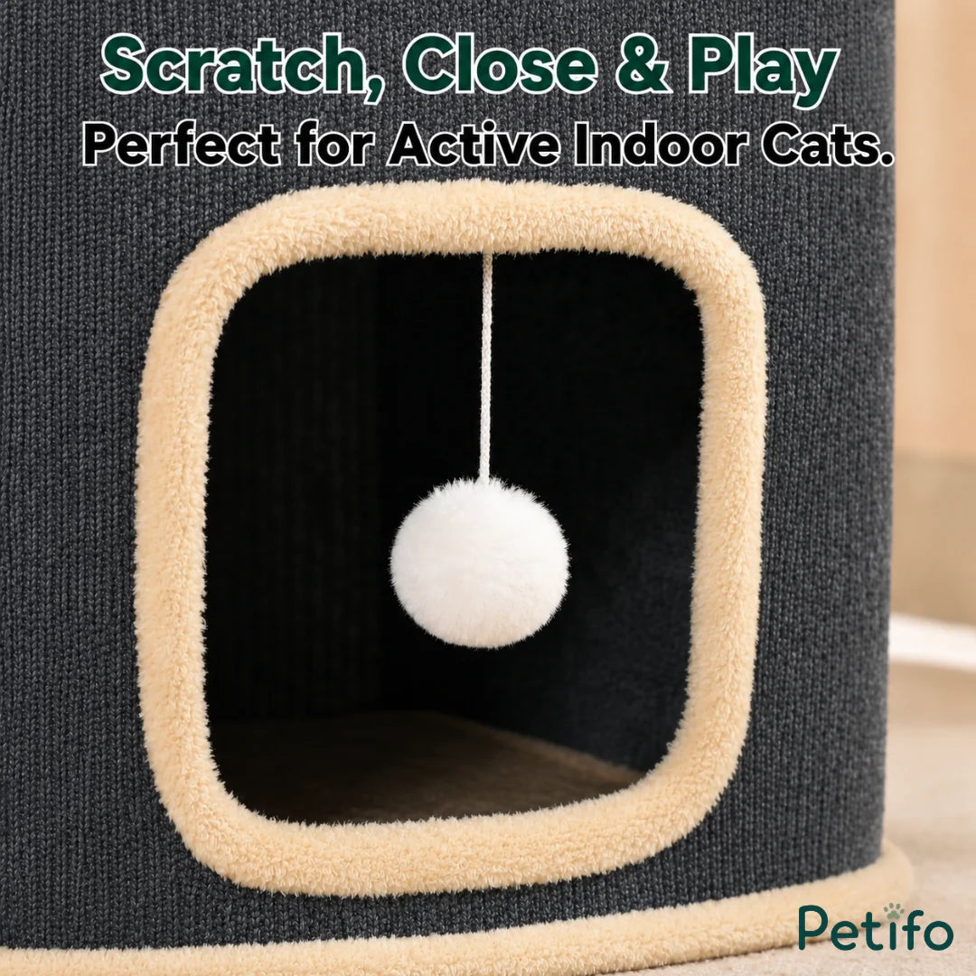 Detailed view of a hanging white plush toy ball inside the opening of the Petifo cat house, suitable for active cats.