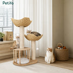 Three domestic cats playing and resting on a Petifo multi-level wooden cat tree in a brightly lit room.