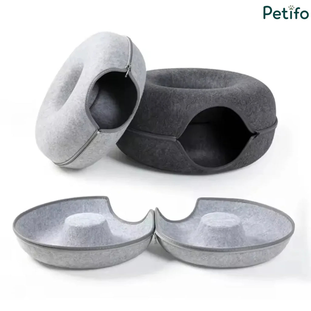 Disassembled view of the dual-layer felt cat tunnel bed showing its separate zippered halves.