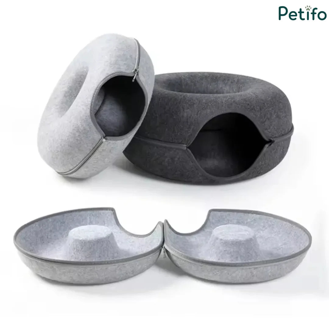 Disassembled view of the dual-layer felt cat tunnel bed showing its separate zippered halves.