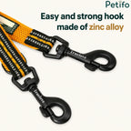 Two durable, black zinc alloy Truelove snap hooks attached to an orange Petifo dog leash.
