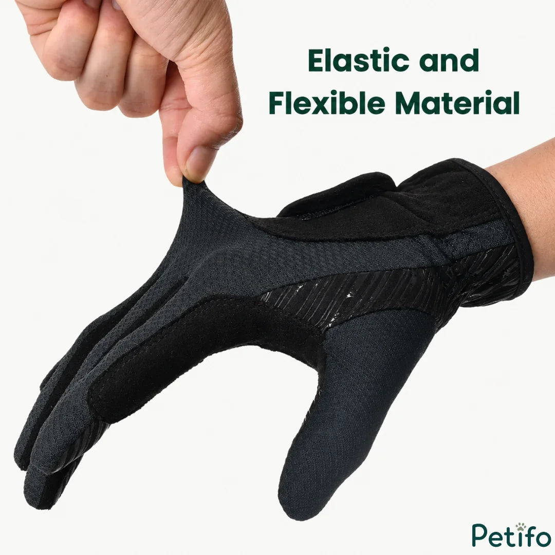 Demonstration of the elastic and flexible material of the black equestrian riding gloves.