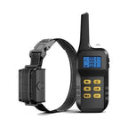 Black electronic dog training collar system complete with a handheld remote transmitter and adjustable strap.