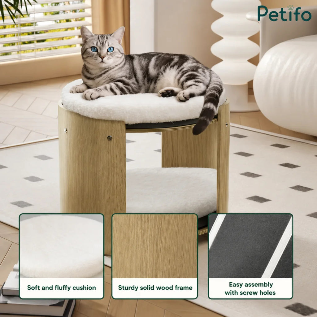 Modern round wooden cat bed featuring a fluffy white cushion, sturdy wood frame, and easy-to-assemble screw-hole design.