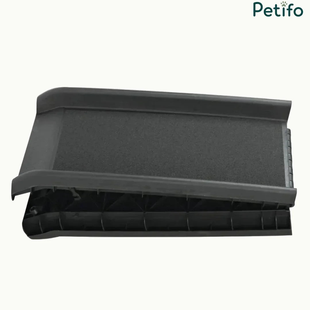 Foldable pet car ramp showing the secure locking mechanism and durable construction.