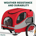 The Petifo pet bike trailer showing rain droplets on the clear front window, highlighting its weather-resistant and durable construction.