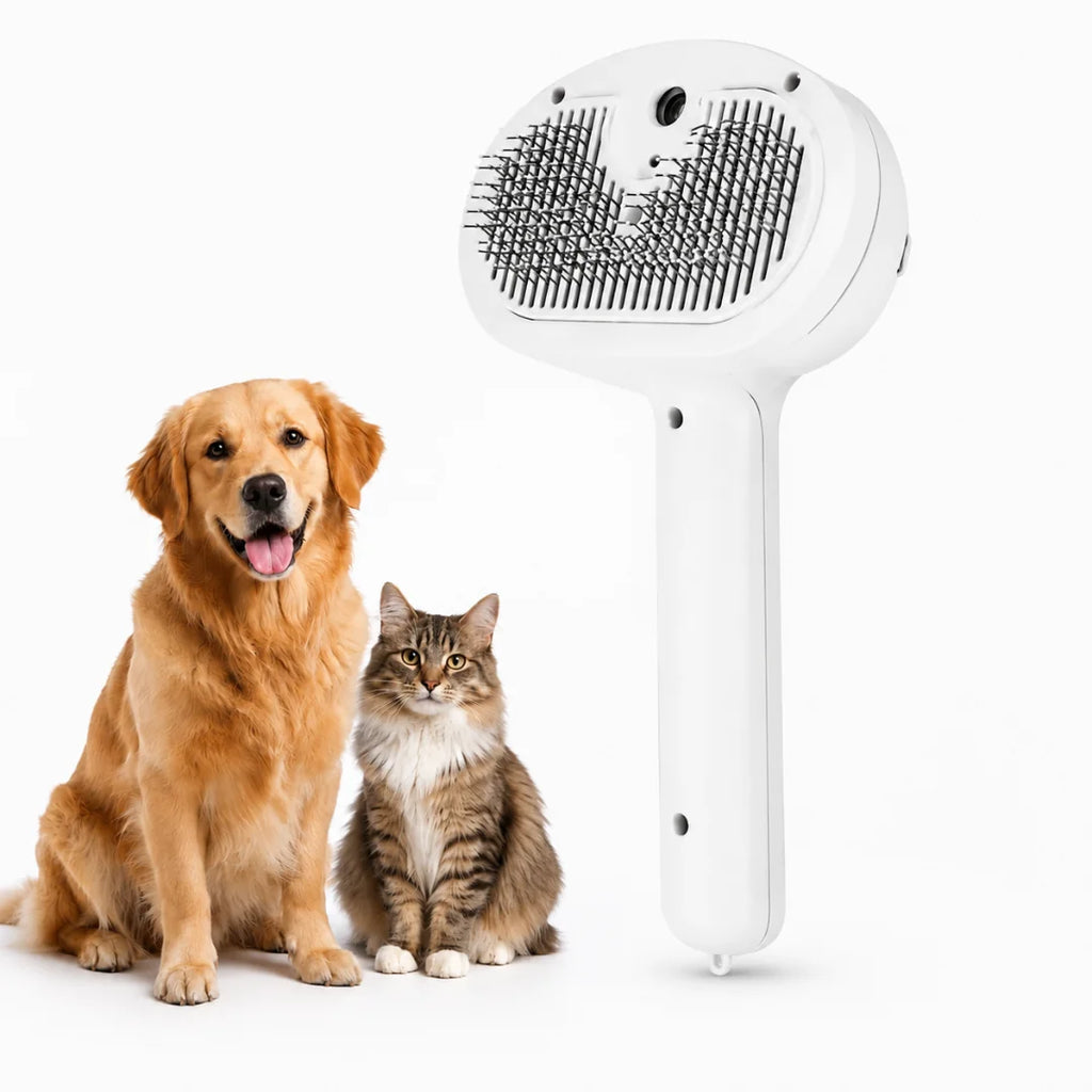 Studio product shot of the white electric pet grooming brush displayed upright next to a smiling golden retriever and a tabby cat.