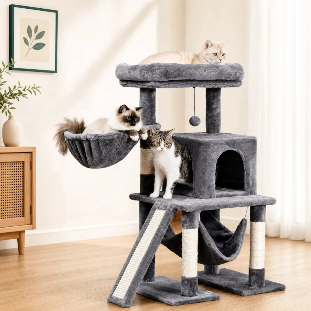 THREE cats relaxing on a grey multi-level cat tower, featuring a top plush perch, a side basket, and an enclosed hideaway condo.