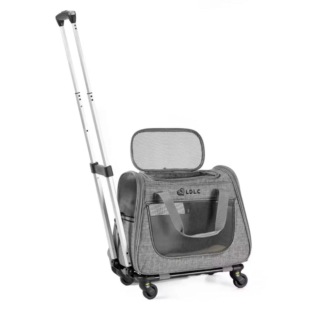 Grey rolling pet carrier with an extended telescoping handle and breathable mesh windows for travel.