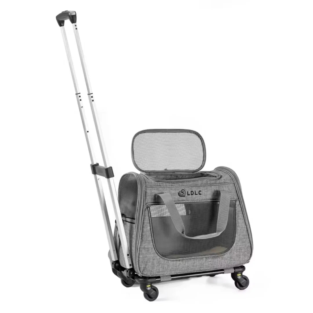 Grey rolling pet carrier with an extended telescoping handle and breathable mesh windows for travel.