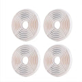 Grid arrangement of four circular replacement water fountain filters for pets.