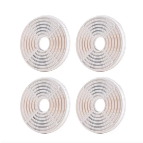 Grid arrangement of four circular replacement water fountain filters for pets.
