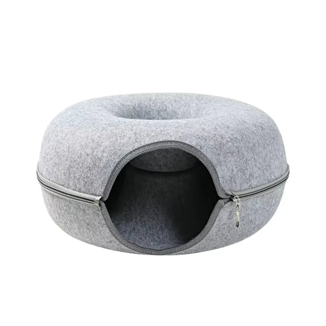 Empty light gray felt doughnut cat cave bed featuring a sturdy wrap-around zipper design.