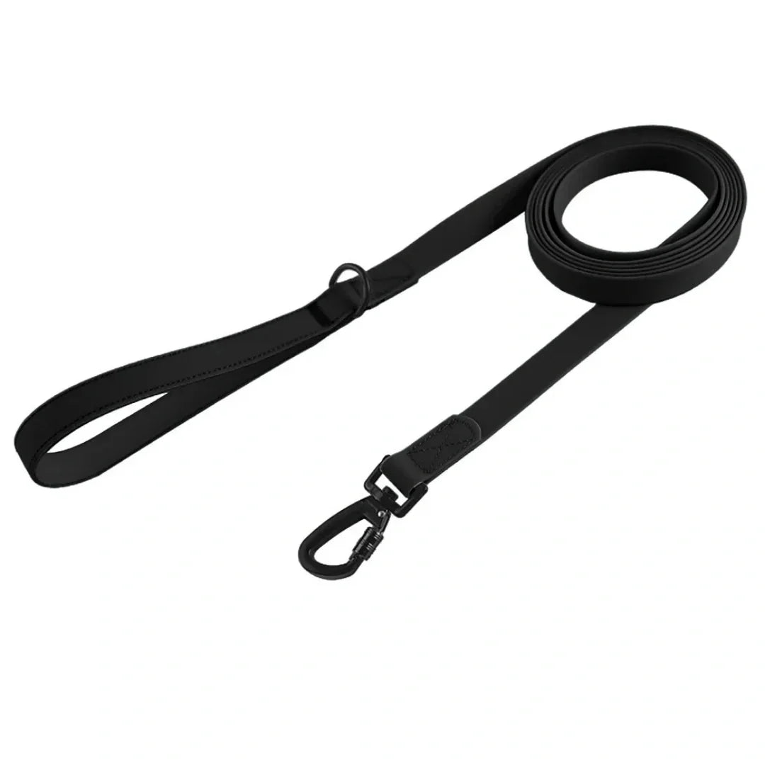 Black waterproof long training leash coiled neatly with a handle and black metal safety hook.