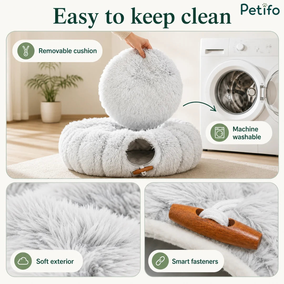 A machine-washable gray cat tunnel bed highlighting a removable cushion, soft exterior, and smart wooden fasteners.