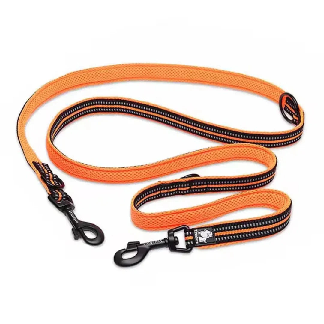 Orange Reflexfit multifunctional dog leash with dual black zinc alloy snap hooks and reflective stitching.