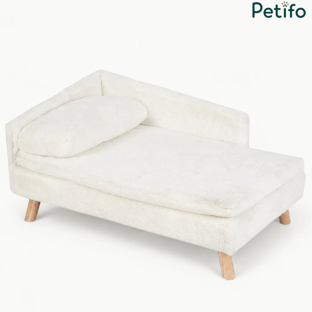 A premium white, plush pet sofa with wooden legs, designed for comfort and style.