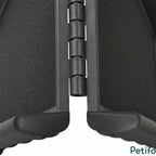 Detailed view of the heavy-duty hinge and integrated handle on the foldable pet car ramp.