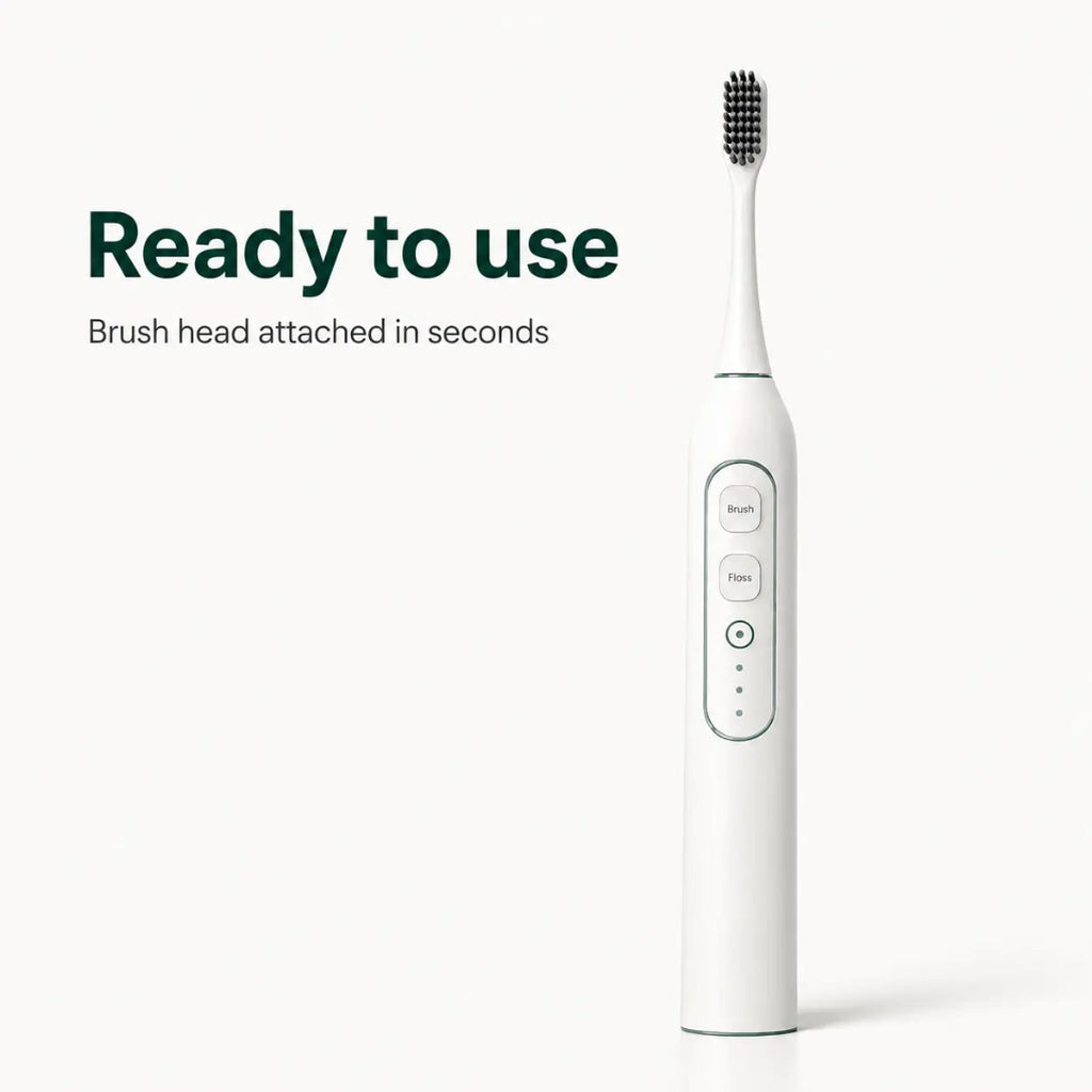 A white electric pet ultrasonic toothbrush with brush and floss mode buttons standing upright.