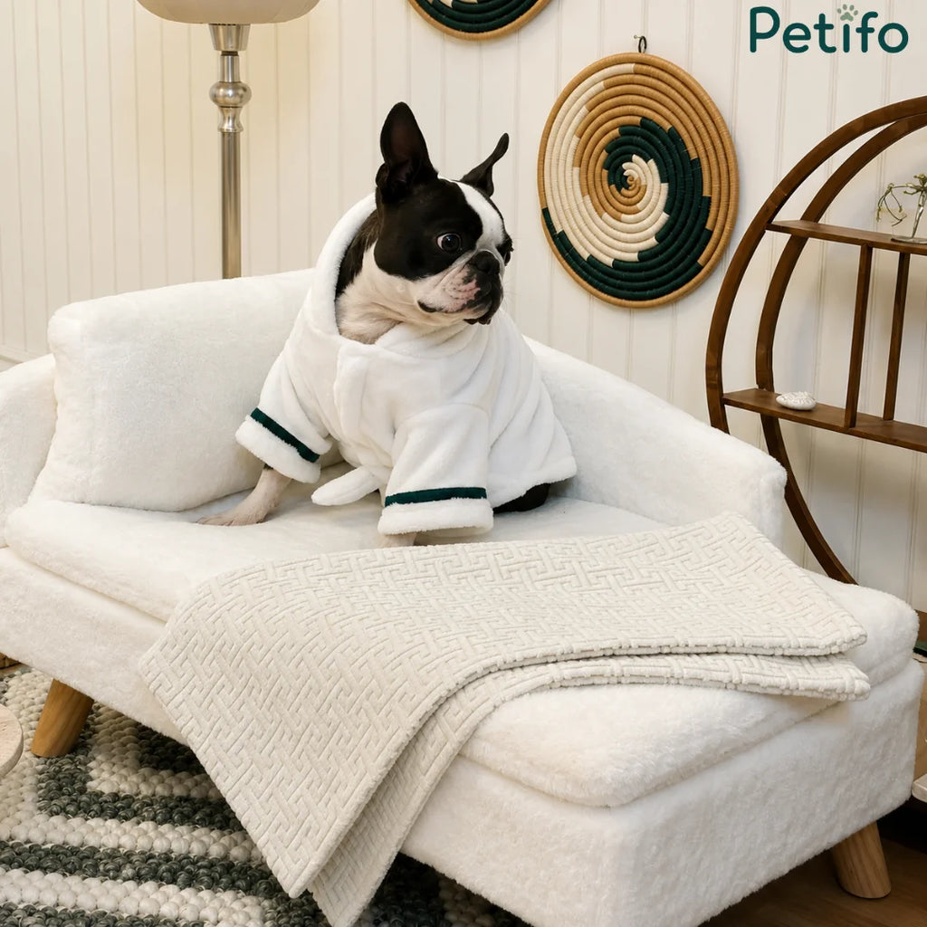 A premium white, plush pet sofa with wooden legs, designed for comfort and style.