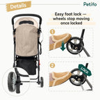 Person pushing a beige Petifo foldable pet stroller along a park path for a walk.