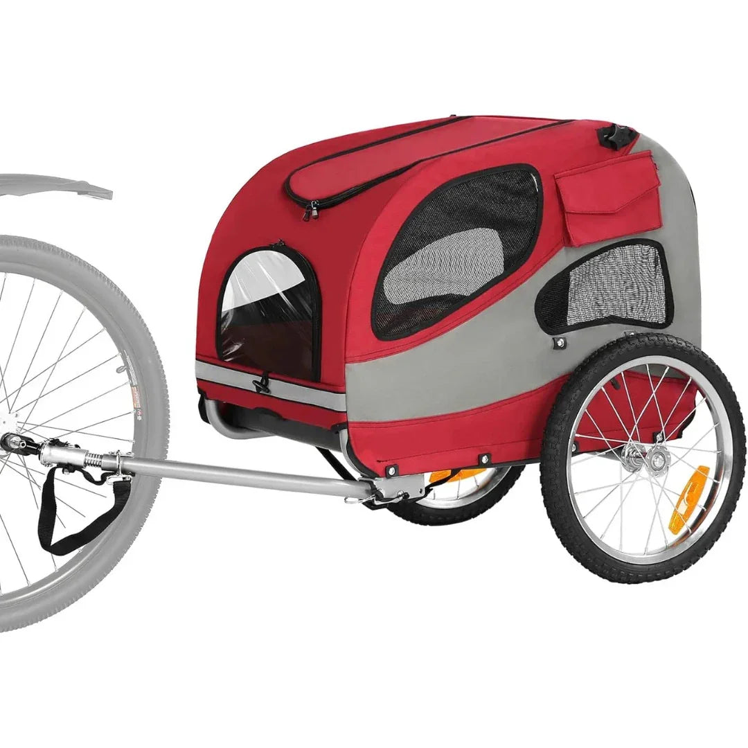 A red and grey Petifo pet bike trailer attached to a bicycle, featuring a weather-resistant design and side reflectors.